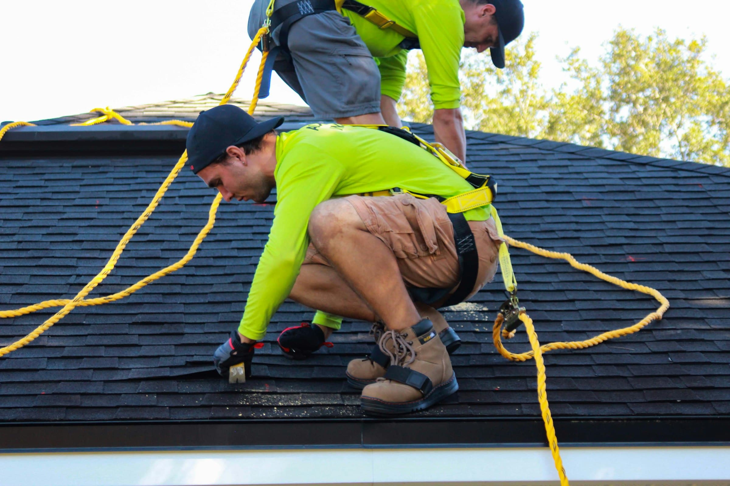 Ridgeline crew installing shingles on a Denver roof